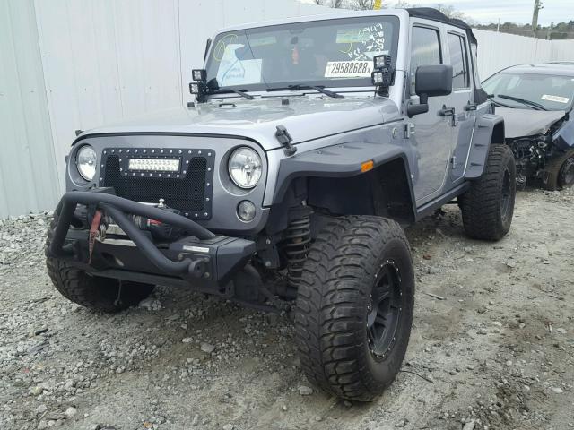 1C4BJWDG0EL204528 - 2014 JEEP WRANGLER U SILVER photo 2