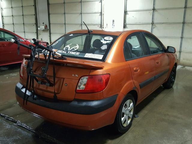 KNADE223696533385 - 2009 KIA RIO BASE ORANGE photo 4