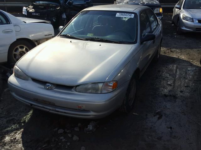 1Y1SK5288YZ409112 - 2000 CHEVROLET GEO PRIZM SILVER photo 2