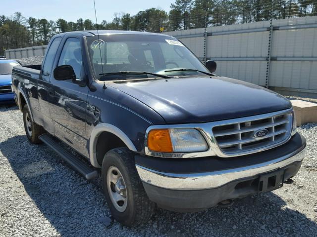 2FTRX18W94CA22451 - 2004 FORD F-150 HERI BLUE photo 1