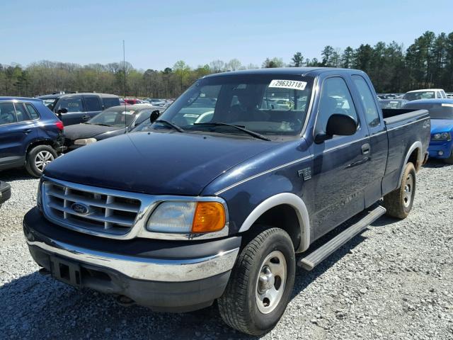 2FTRX18W94CA22451 - 2004 FORD F-150 HERI BLUE photo 2