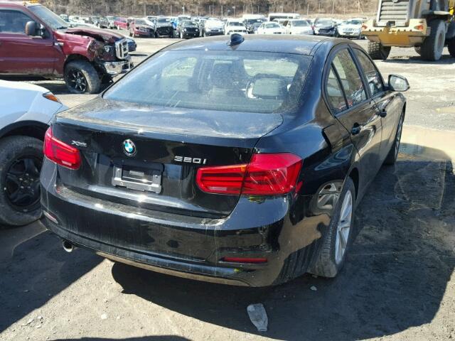 WBA8E5G56HNU22451 - 2017 BMW 320 XI BLACK photo 4