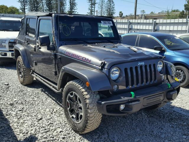 1C4HJWFG0GL284133 - 2016 JEEP WRANGLER U GRAY photo 1