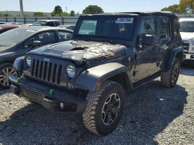 1C4HJWFG0GL284133 - 2016 JEEP WRANGLER U GRAY photo 2