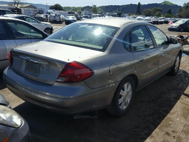 1FAHP56S73G277864 - 2003 FORD TAURUS SEL GRAY photo 4