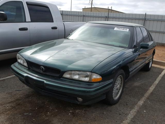 1G2HX52L9R4200503 - 1994 PONTIAC BONNEVILLE GREEN photo 2