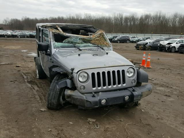 1C4HJWDGXHL596268 - 2017 JEEP WRANGLER U GRAY photo 1