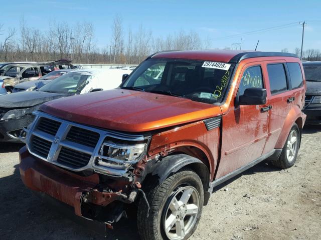 1D8GU28K47W735030 - 2007 DODGE NITRO SXT ORANGE photo 2