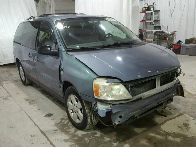 2FMZA57624BA86021 - 2004 FORD FREESTAR S BLUE photo 1