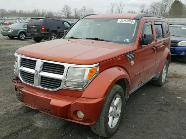 1D8GU28KX7W731130 - 2007 DODGE NITRO SXT ORANGE photo 2