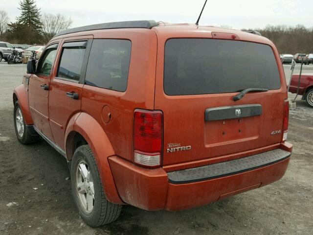 1D8GU28KX7W731130 - 2007 DODGE NITRO SXT ORANGE photo 3