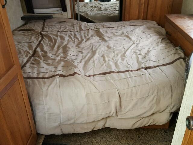 4YDF34025A4700369 - 2010 KEYSTONE MONTANA WHITE photo 6