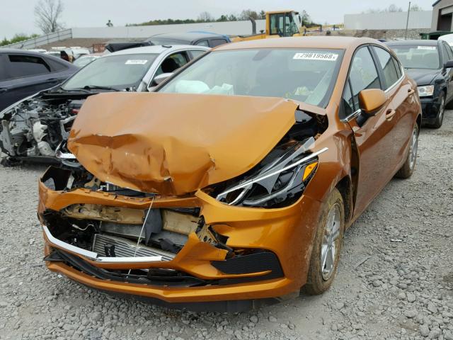 3G1BE6SM2HS559706 - 2017 CHEVROLET CRUZE LT ORANGE photo 2