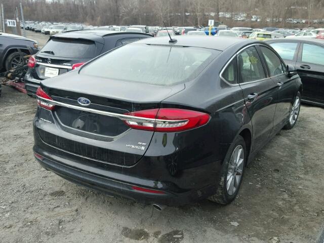 3FA6P0LU5HR390518 - 2017 FORD FUSION SE BLACK photo 4