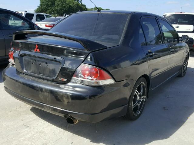 JA3AJ66F64U028687 - 2004 MITSUBISHI LANCER RAL BLACK photo 4