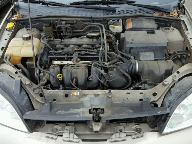 1FAFP34N85W141244 - 2005 FORD FOCUS ZX4 TAN photo 7