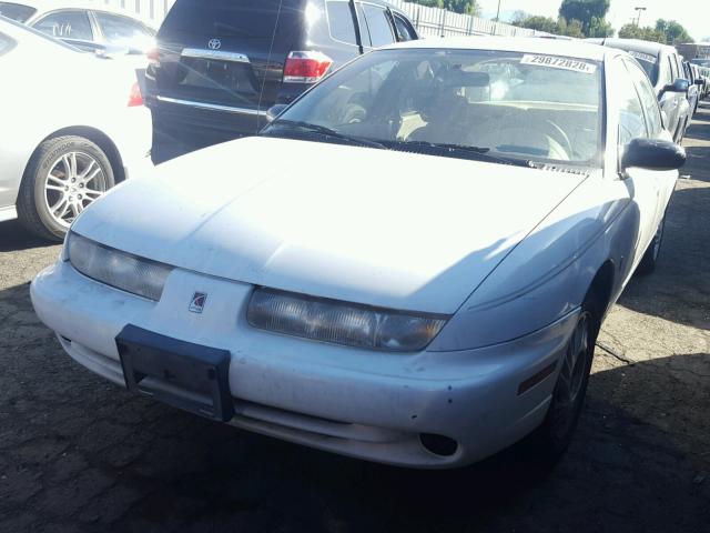 1G8ZK527XXZ100969 - 1999 SATURN SL2 WHITE photo 2