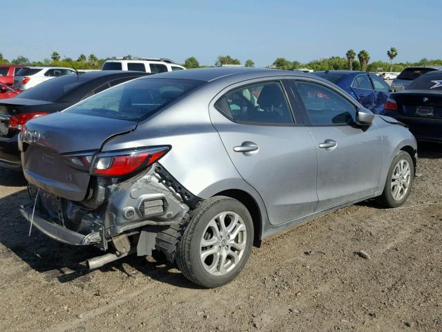 3MYDLBZV8GY134520 - 2016 TOYOTA SCION IA SILVER photo 4