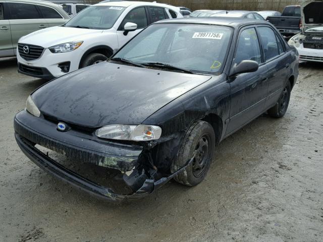 1Y1SK52801Z405058 - 2001 CHEVROLET GEO PRIZM BLACK photo 2