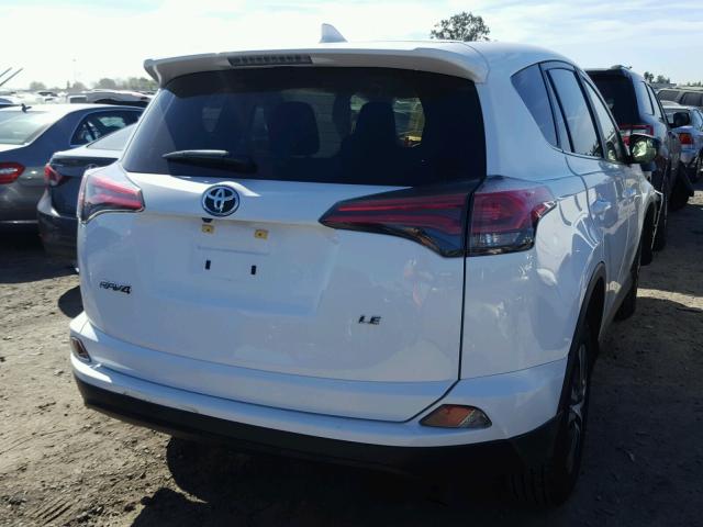 JTMZFREV6JJ152990 - 2018 TOYOTA RAV4 LE WHITE photo 4