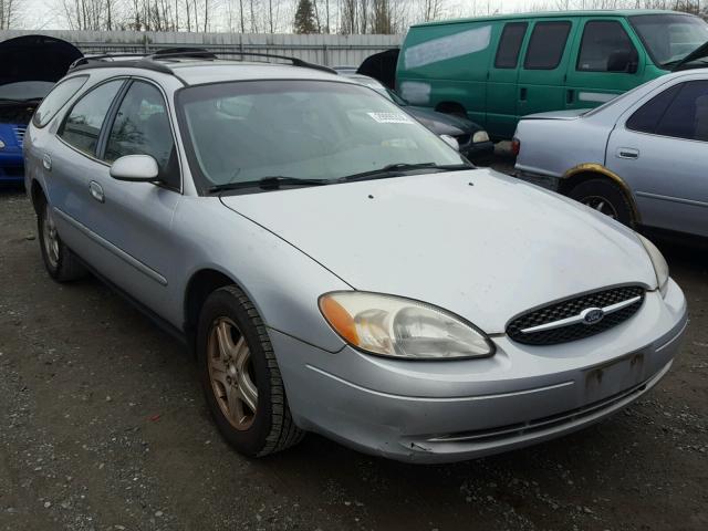 1FAFP59U1YG119323 - 2000 FORD TAURUS SE SILVER photo 1