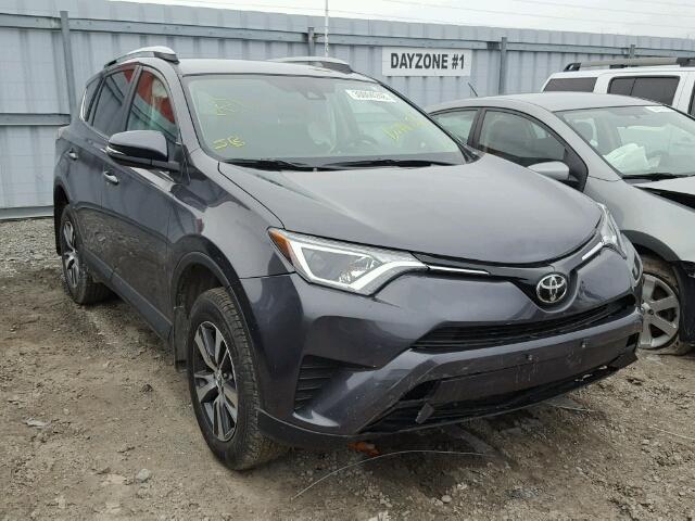 2T3ZFREV1JW438084 - 2018 TOYOTA RAV4 LE GRAY photo 1