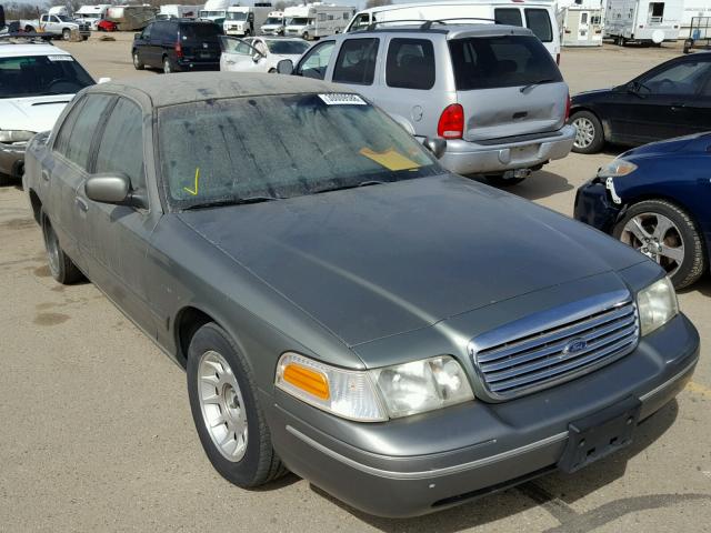 2FAFP74W1WX148347 - 1998 FORD CROWN VICT GRAY photo 1