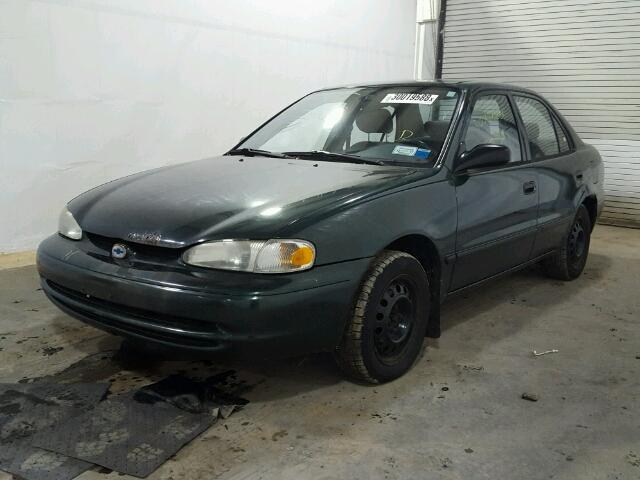 1Y1SK52822Z419464 - 2002 CHEVROLET GEO PRIZM GREEN photo 2