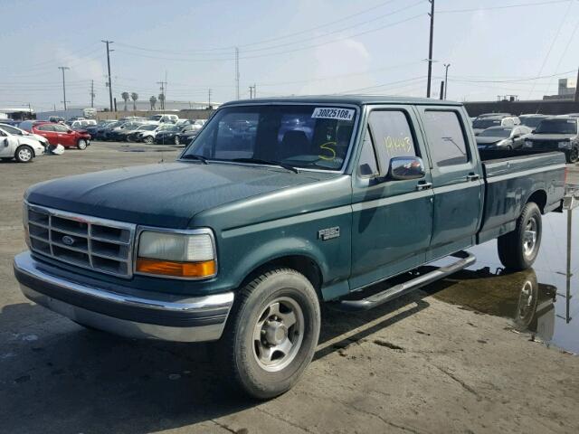 1FTJW35G1REA35883 - 1994 FORD F350 GREEN photo 2