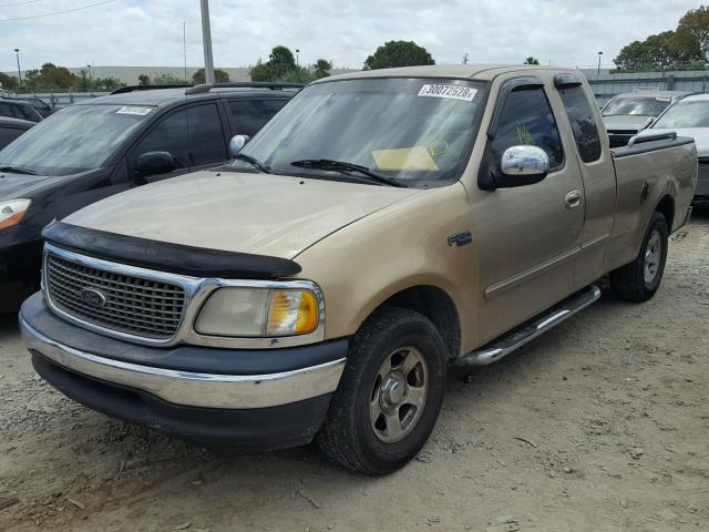 1FTZX1721XKA45706 - 1999 FORD F150 BROWN photo 2