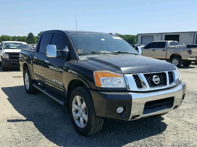 1N6BA0EC9AN313283 - 2010 NISSAN TITAN XE BLACK photo 1