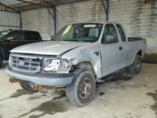 2FTRX18W94CA39203 - 2004 FORD F-150 HERI SILVER photo 2