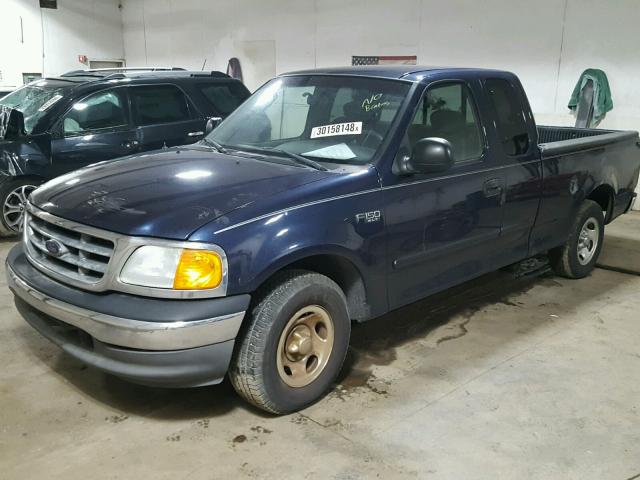 2FTRX17264CA02074 - 2004 FORD F-150 HERI BLUE photo 2