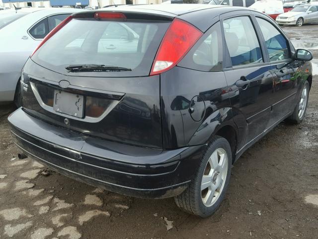 1FAHP37N47W140213 - 2007 FORD FOCUS ZX5 BLACK photo 4