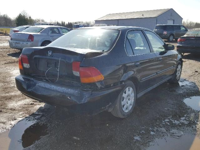 1HGEJ6579WL015052 - 1998 HONDA CIVIC LX BLACK photo 4