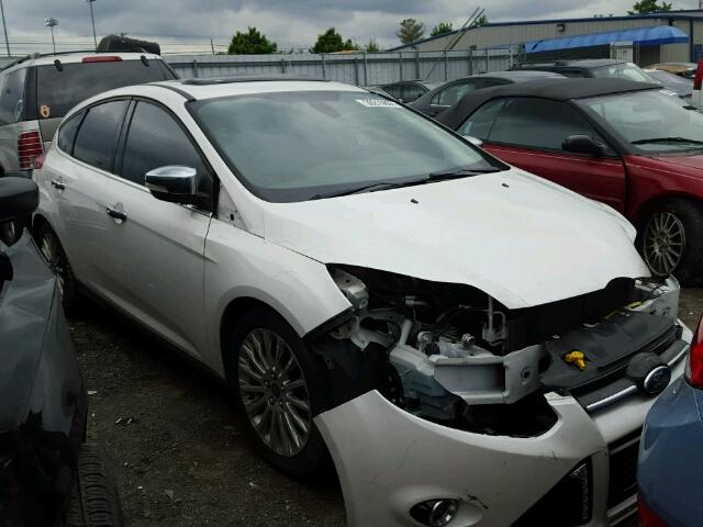 1FAHP3N24CL271064 - 2012 FORD FOCUS TITA BLACK photo 1