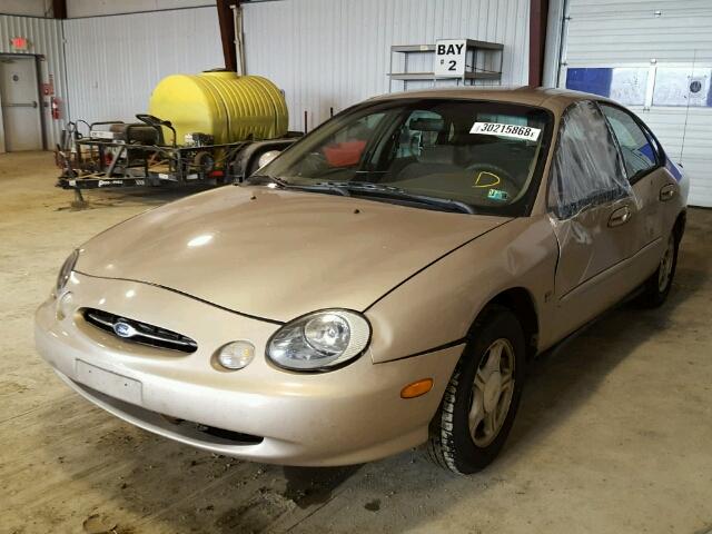 1FAFP53S0XG314903 - 1999 FORD TAURUS SE GOLD photo 2