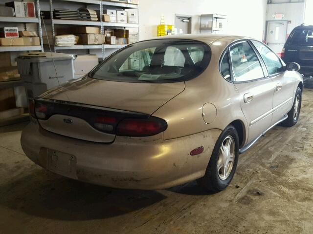 1FAFP53S0XG314903 - 1999 FORD TAURUS SE GOLD photo 4