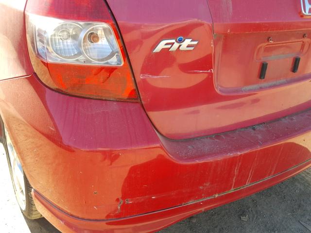 JHMGD38627S064616 - 2007 HONDA FIT S RED photo 9