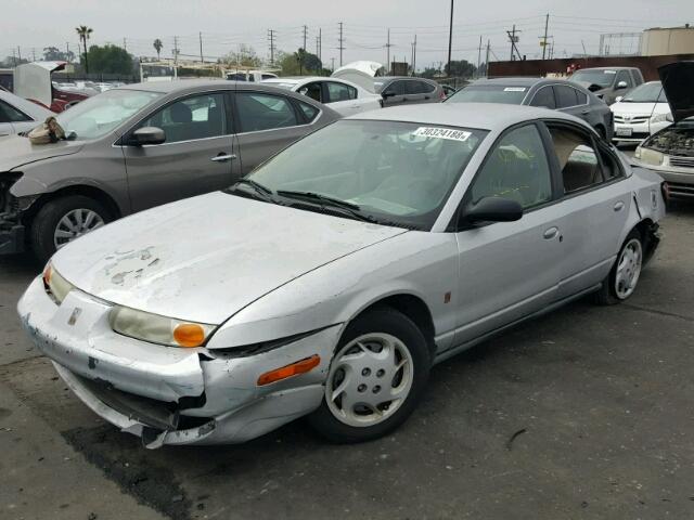 1G8ZK52702Z255166 - 2002 SATURN SL2 SILVER photo 2