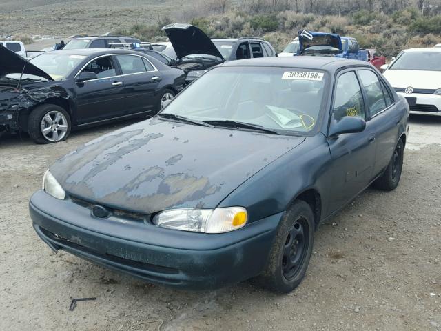 1Y1SK5282XZ441133 - 1999 CHEVROLET GEO PRIZM BLACK photo 2