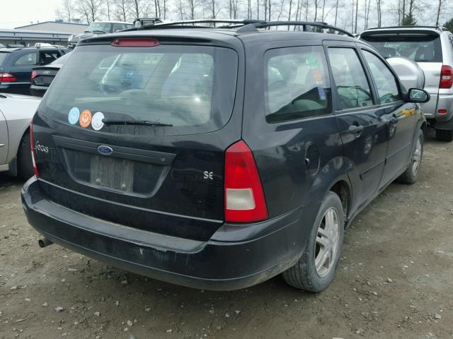 1FAHP36321W144011 - 2001 FORD FOCUS SE BLACK photo 4