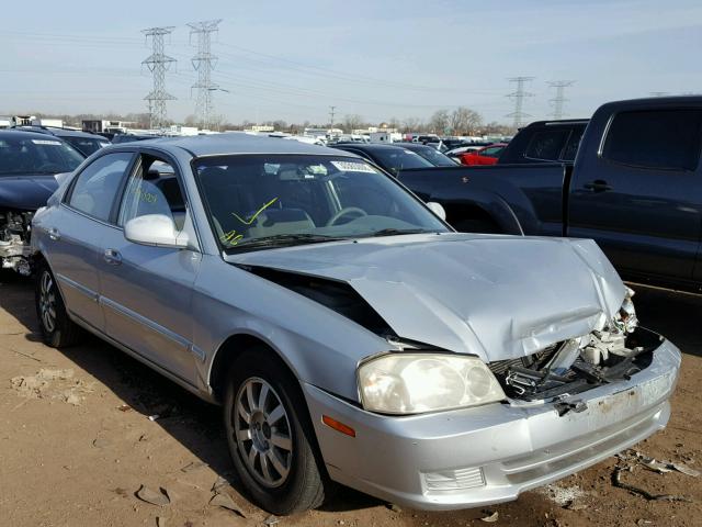 KNAGD128X25108818 - 2002 KIA OPTIMA MAG SILVER photo 1