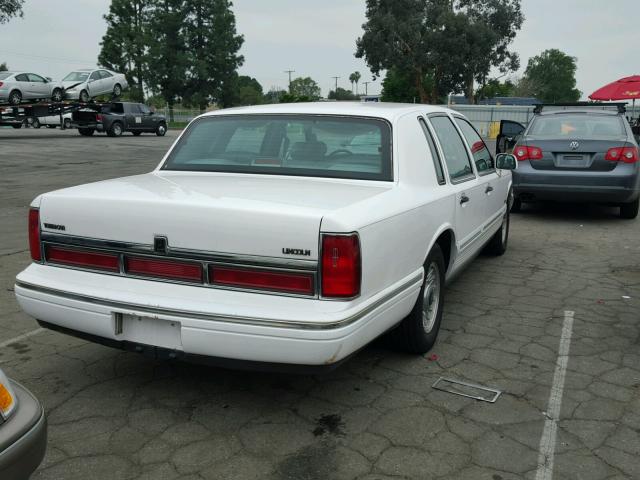 1LNLM81W8VY663016 - 1997 LINCOLN TOWN CAR E WHITE photo 4