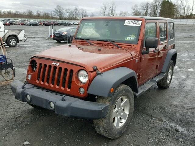 1C4BJWDG3EL198403 - 2014 JEEP WRANGLER U ORANGE photo 2