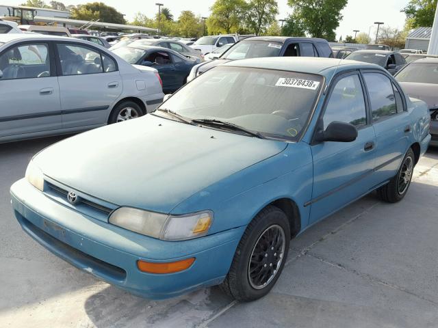 1NXAE09B9SZ318619 - 1995 TOYOTA COROLLA LE GREEN photo 2