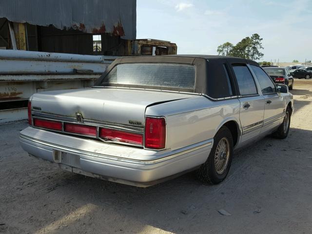 1LNLM82W1VY710188 - 1997 LINCOLN TOWN CAR S BLUE photo 4