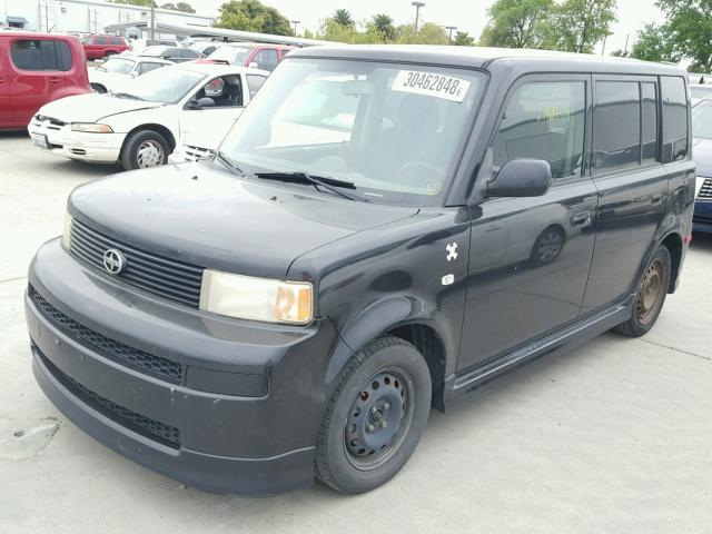 JTLKT334740160175 - 2004 TOYOTA SCION BLACK photo 2