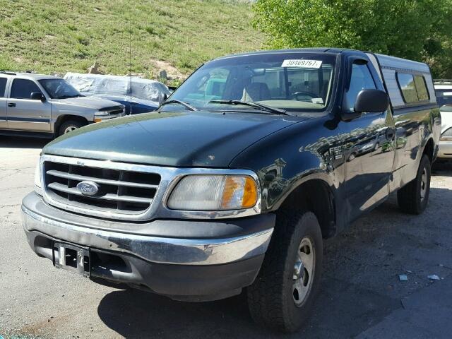 2FTRF18W14CA80475 - 2004 FORD F150 HERIT BLACK photo 2