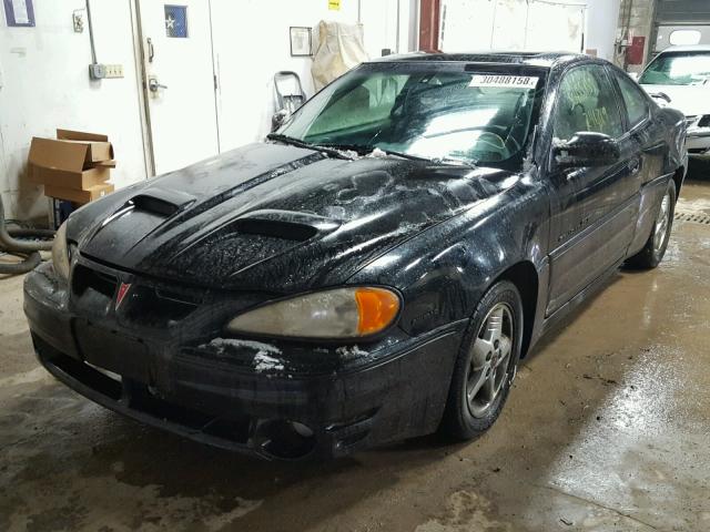 1G2NW12E22C218854 - 2002 PONTIAC GRAND AM G BLACK photo 2